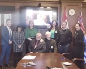Members of the Delegation Standing in the office