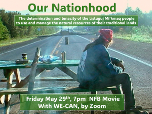 A Indigenous person sitting on a picnic bench in the middle of the road